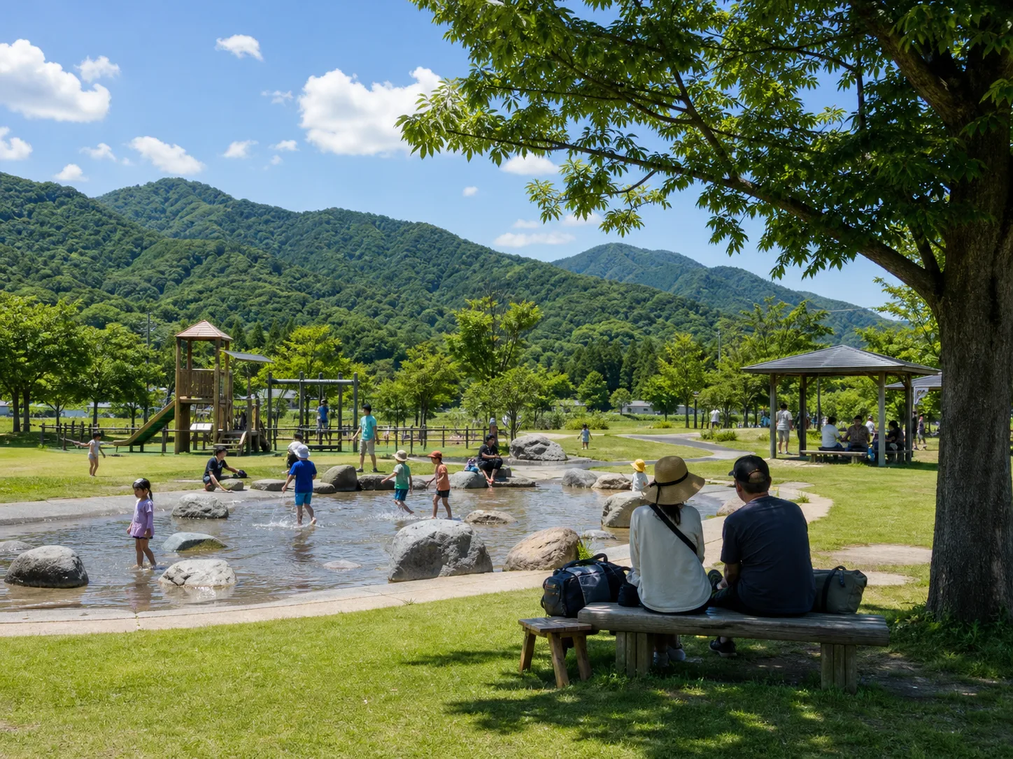 水辺と遊具で休憩する家族の写真調イメージ