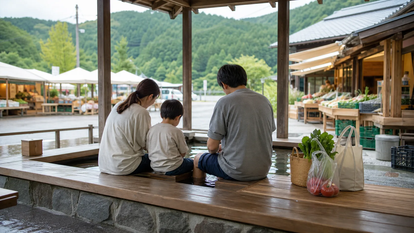家族で足湯休憩をする写真調画像