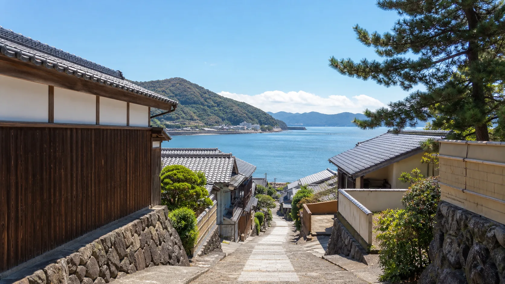 旧東海道の坂道と海辺の寄り道を表す写真調イメージ